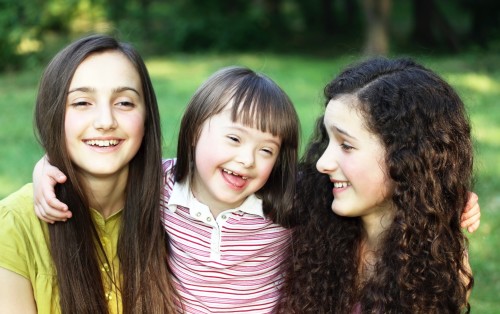 Happy little girl with sisters